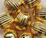 Rillenperle Olive 10x13mm gold